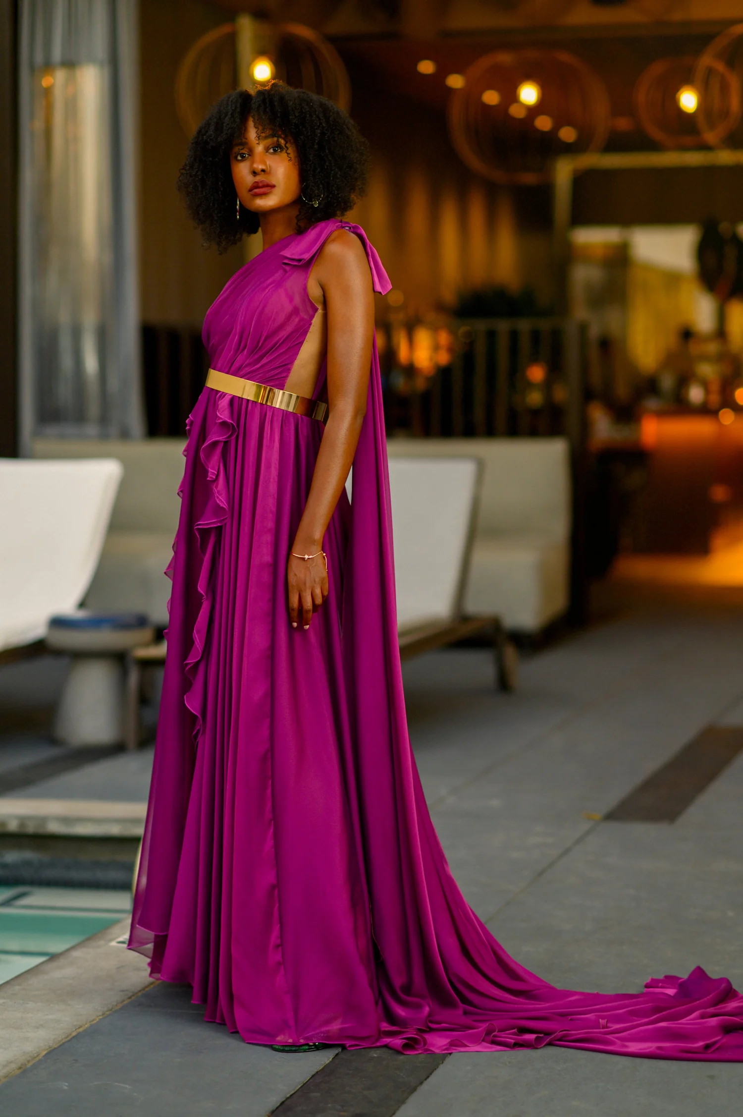 Zoë in an elegant flowing magenta gown